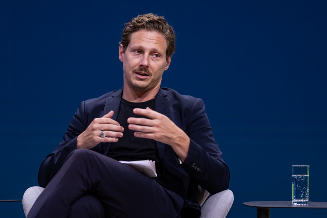Manuel Kilian speaking on stage